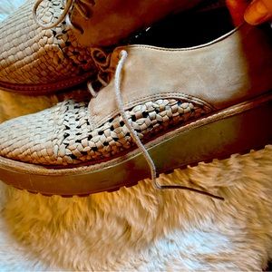 Eileen Fisher tan lace up shoes.